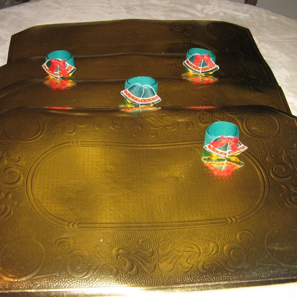 Four Placemats Gold Color, Four Napkin Rings, Xmas Bells Motif $5.00 ADD ON ITEM
